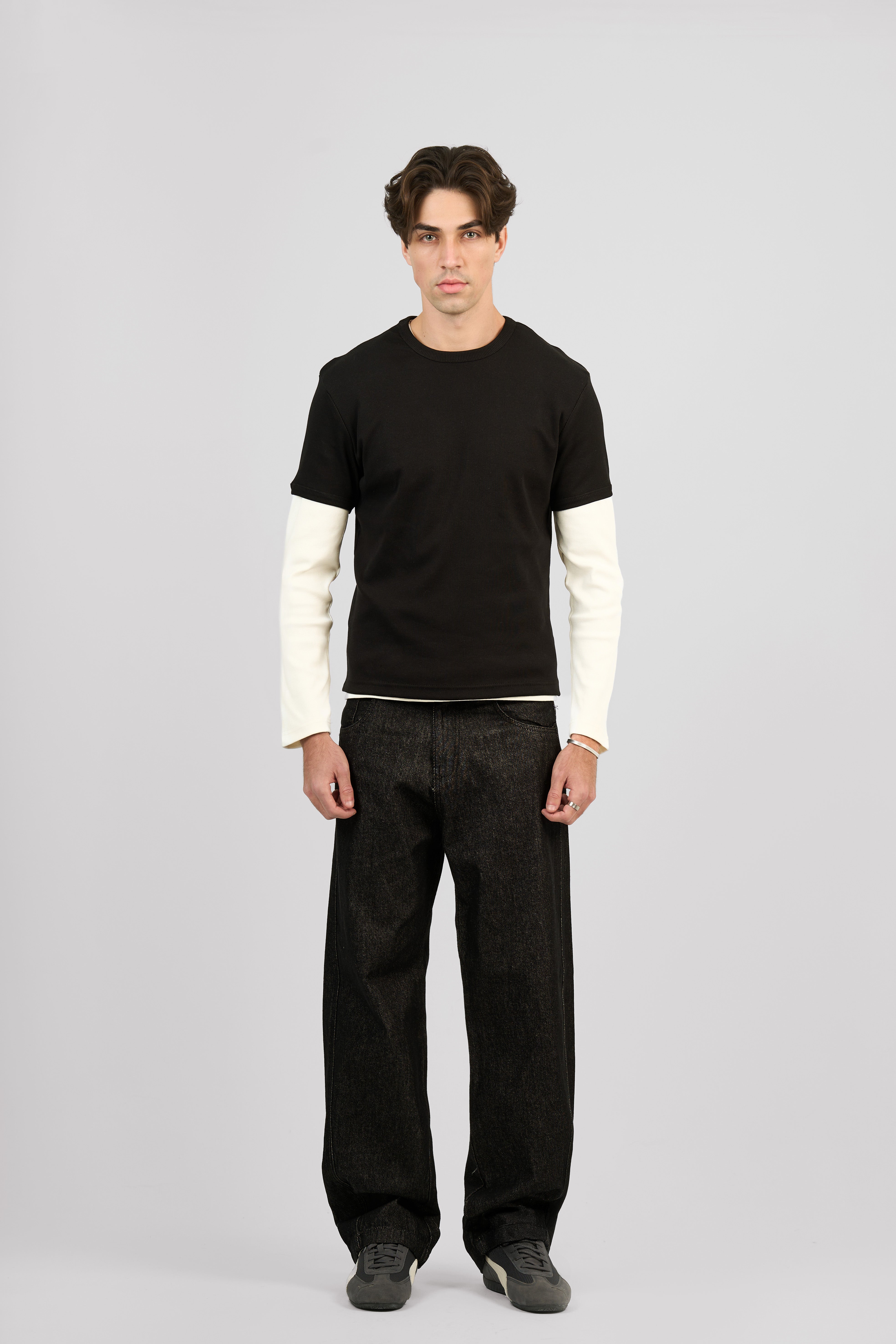 RAW BLACK X BLACK SLANTED JEANS