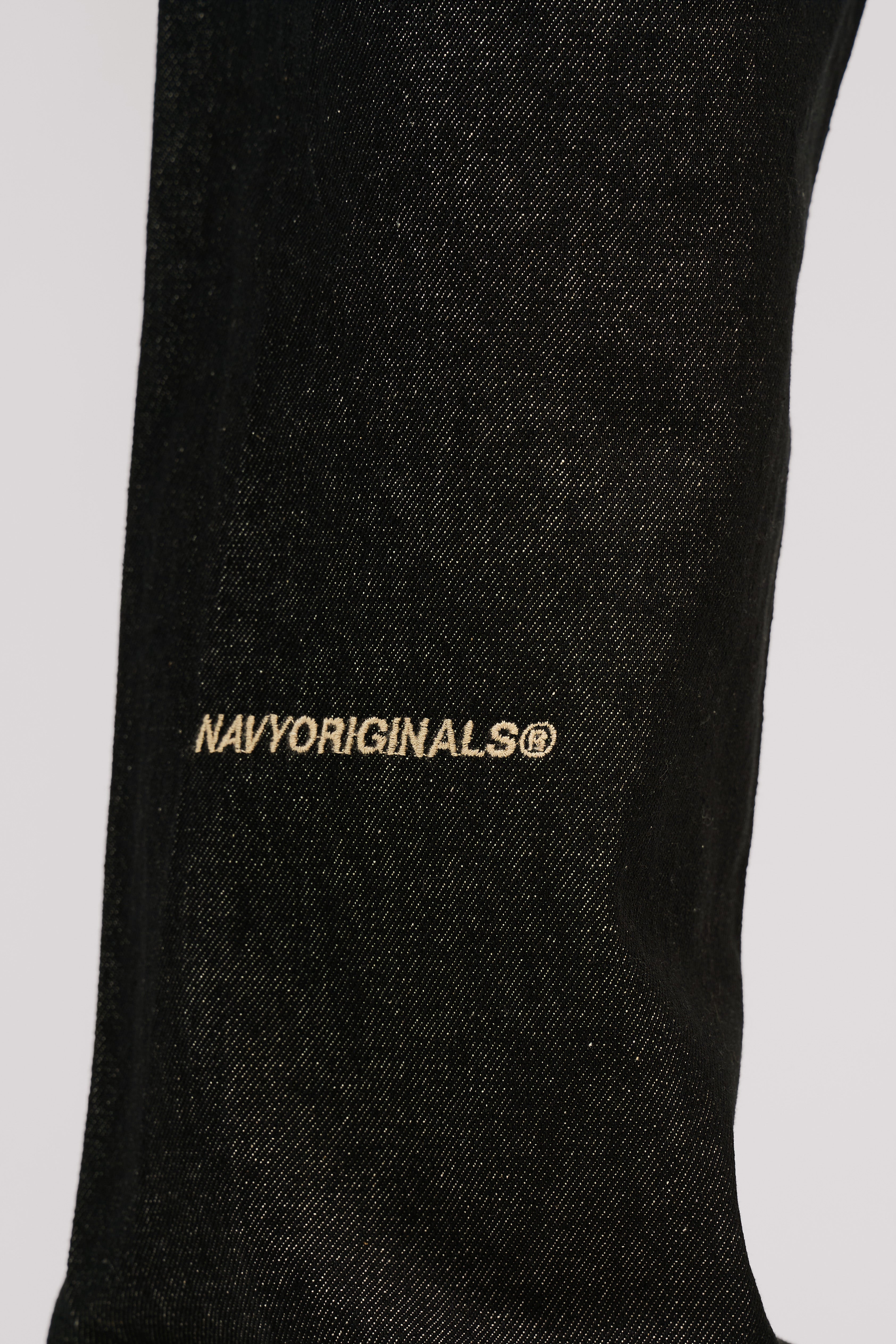 RAW BLACK X BLACK SLANTED JEANS