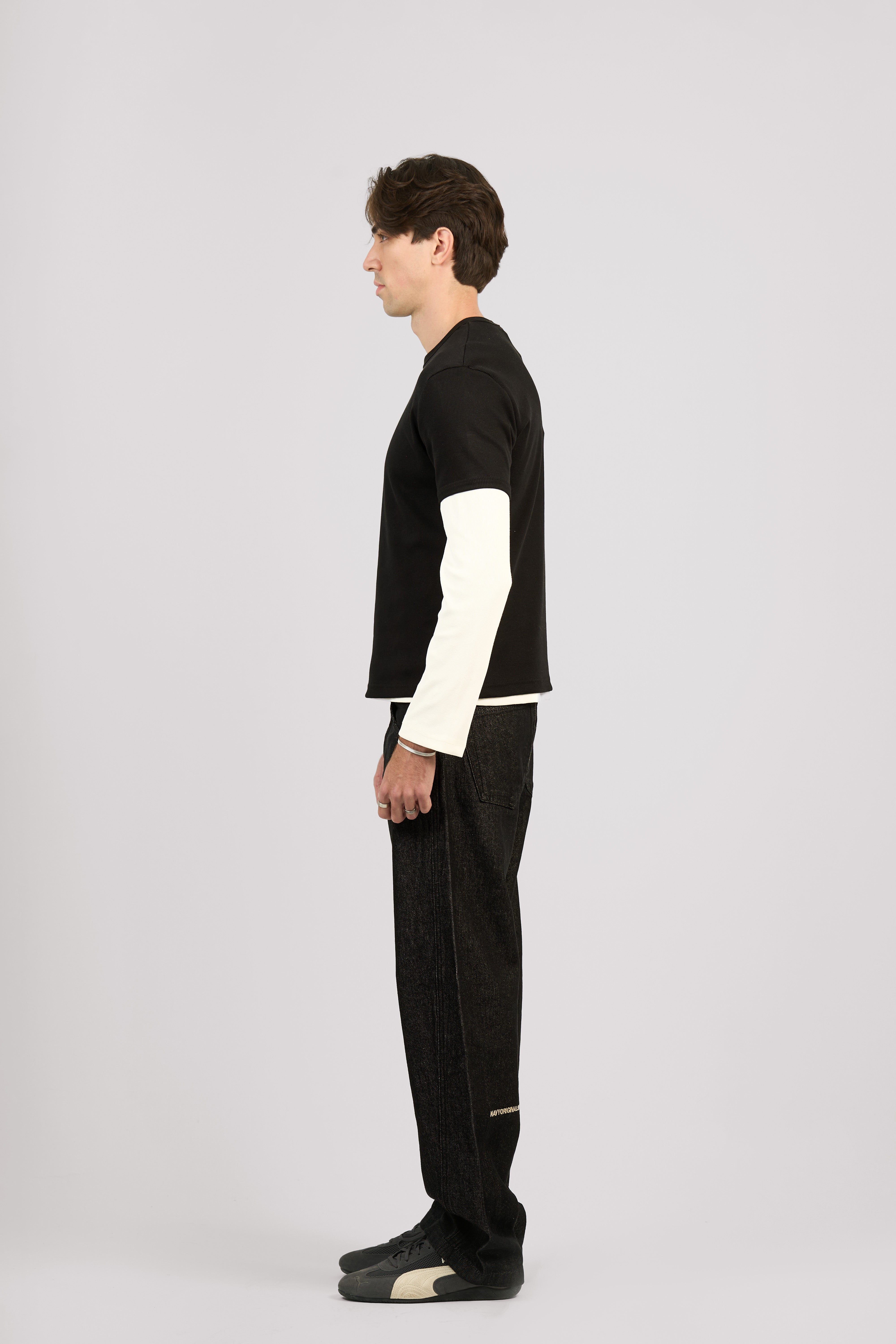 RAW BLACK X BLACK SLANTED JEANS