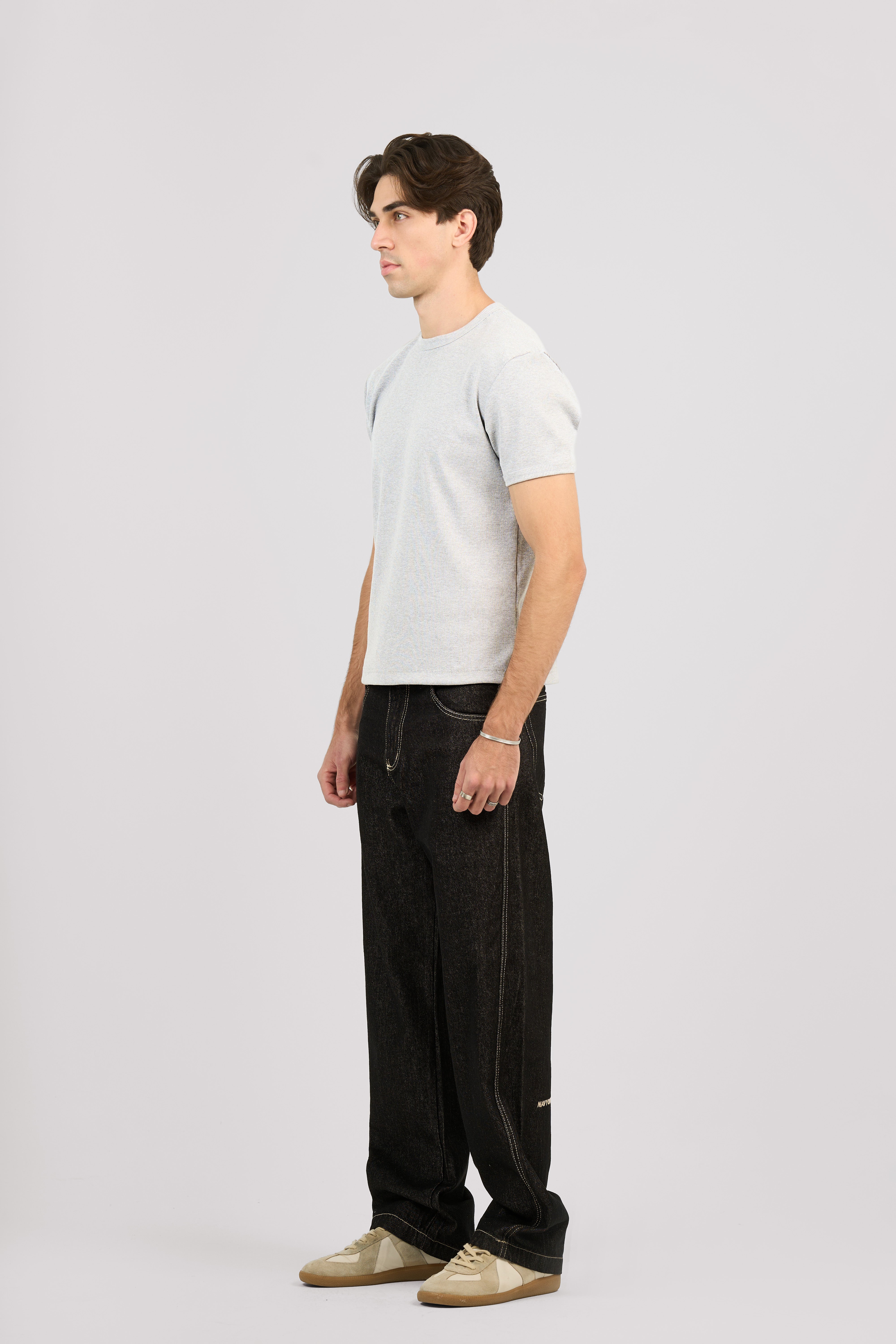 RAW BLACK X WHITE SLANTED JEANS